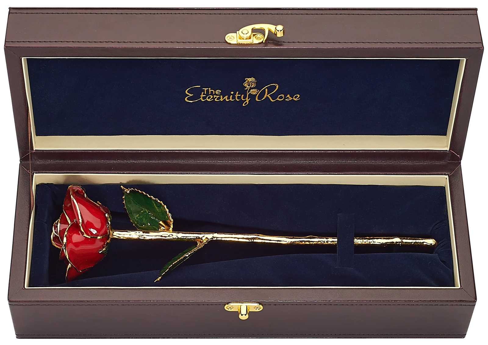 A red glazed natural rose trimmed in 24-karat gold in its open presentation case